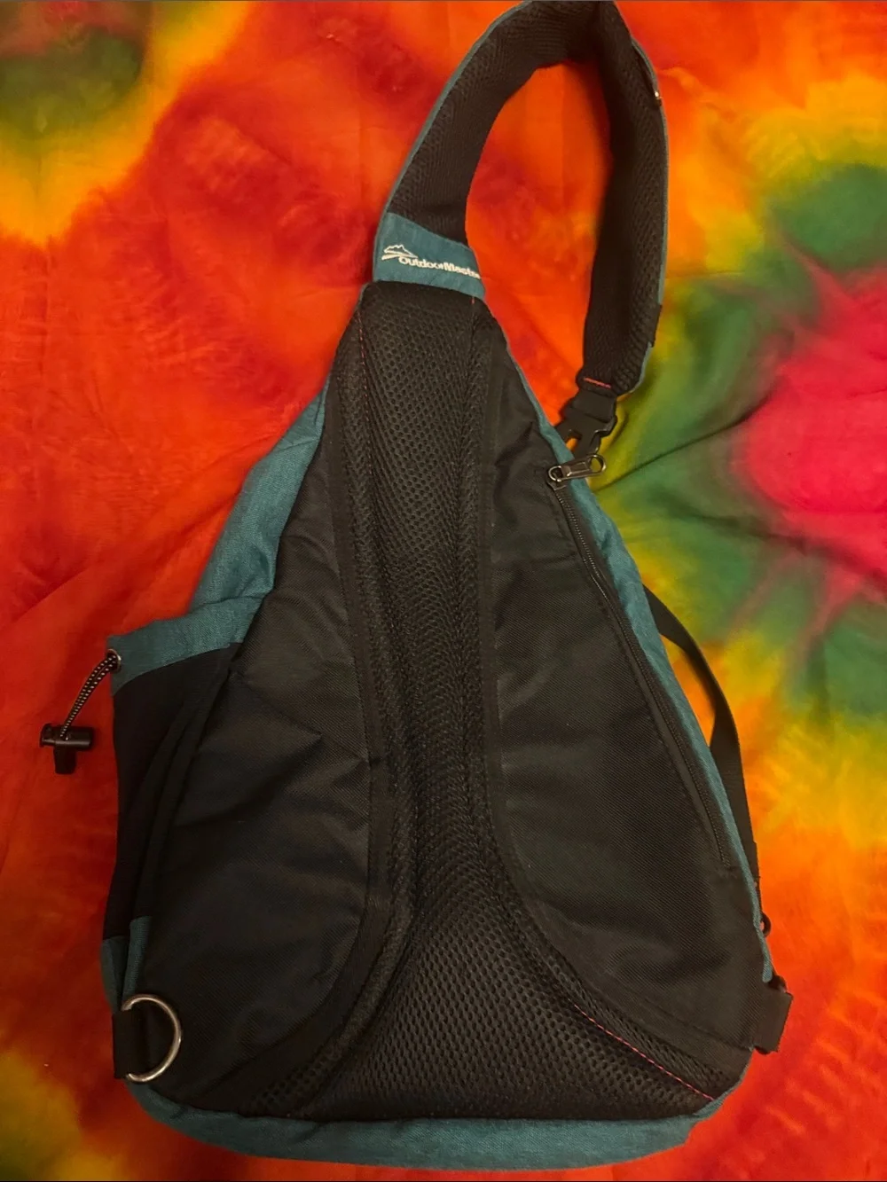 Teal Sling Backpack with Red Accent